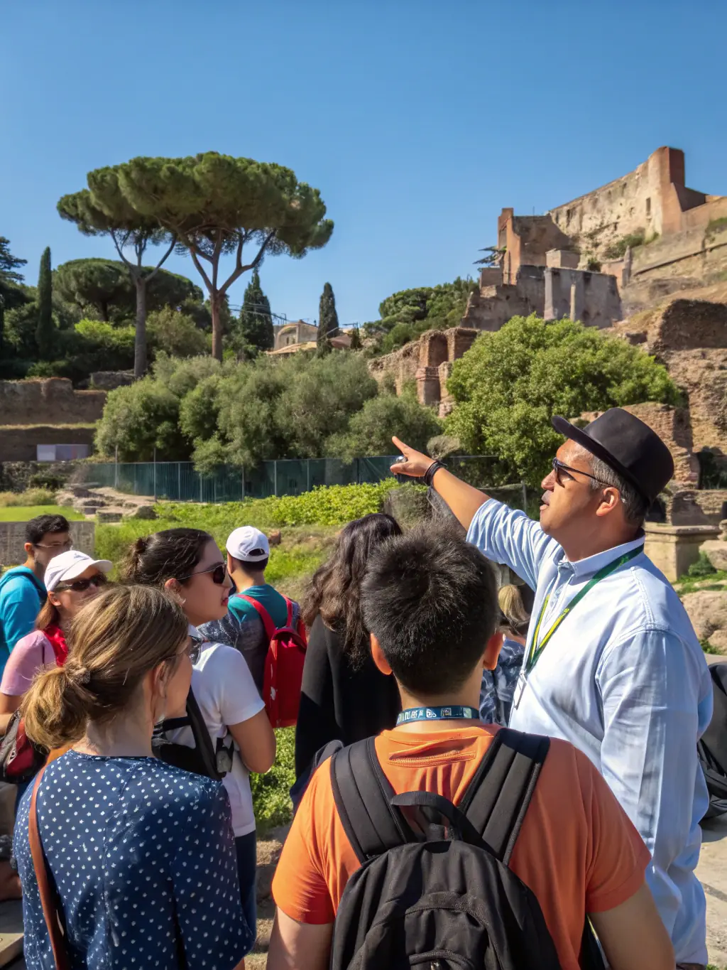 A photograph of volunteers participating in a guided tour of the Chassey-le-Camp site, focusing on the historical significance of the location.